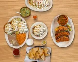 Nina's Tacos logo