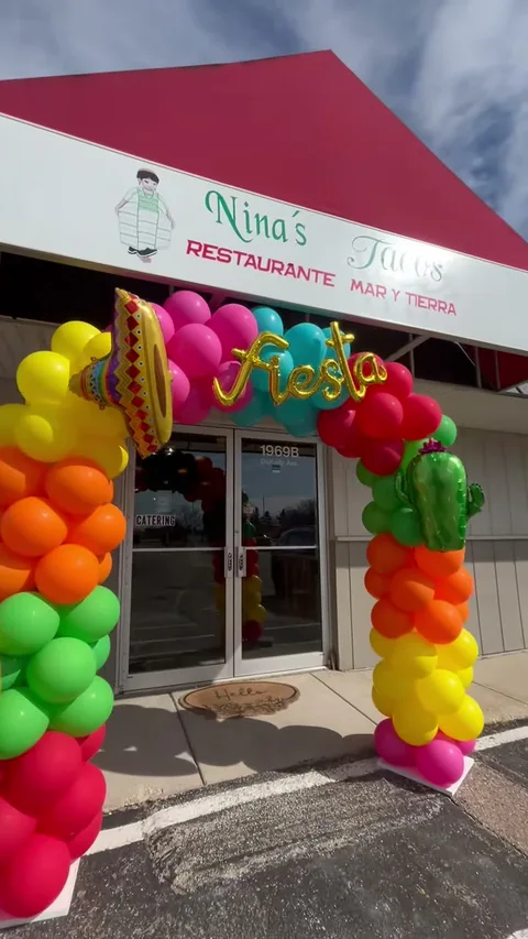 Nina's Tacos entrance decorated for the March 2026 reopening