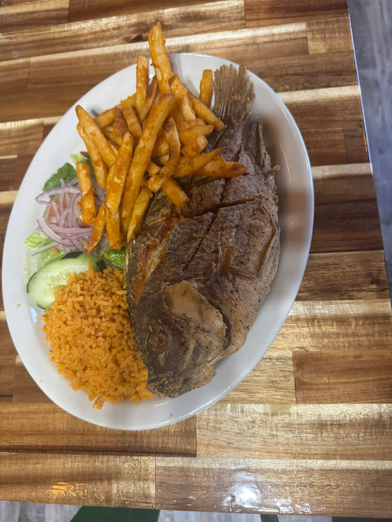 Fried fish dinner with sides
